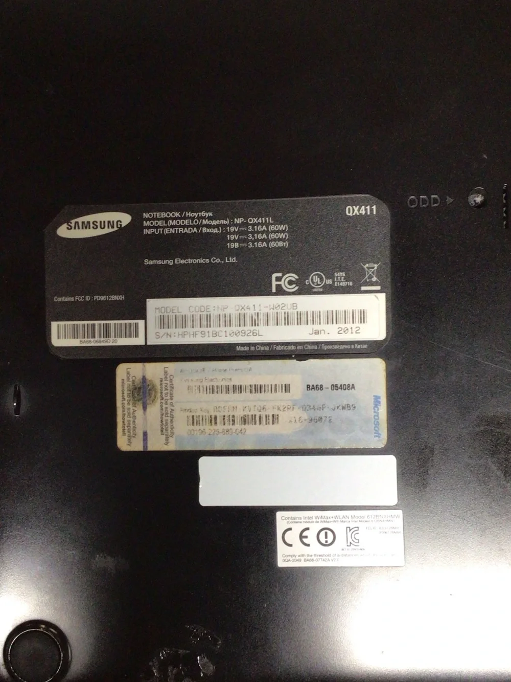 Samsung Silver and Black Laptop with Windows 7 Setup Screen